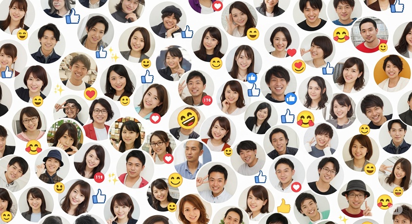 多数の顔写真が並び、それぞれに「いいね」や笑顔の絵文字、ハートマークなどが表示されており、インターネット上での交流を示しています。