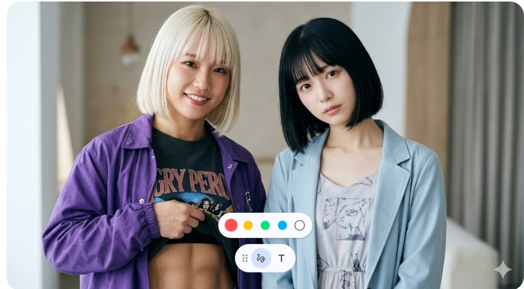 鍛えられた腹筋を少し見せる金髪の女性と、その隣でアンニュイな表情を浮かべる黒髪の女性