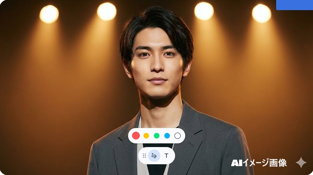 舞台照明を背景に立つ端正な顔立ちのアジア人俳優のポートレート